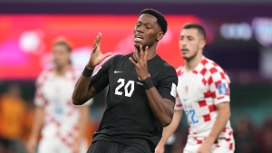 Canada forward Jonathan David reacts after a missed shot on net during second half group F World Cup soccer action against Croatia at the Khalifa International Stadium in Al Rayyan, Qatar on Sunday, Nov. 27, 2022. THE CANADIAN PRESS/Nathan Denette