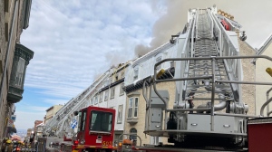 A fire at the Acadia Hotel in Quebec City drew 80 firefighters to put out the blaze. SOURCE: SPCIQ/Twitter
