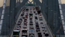 In this Dec. 10, 2015, file photo, vehicles make their way westbound on Interstate 80 across the San Francisco-Oakland Bay Bridge as seen from Treasure Island in San Francisco. (AP Photo/Ben Margot, File)