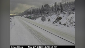 A photo from a DriveBC highway camera shows snow on a closed portion of the Coquihalla Highway on Nov. 27, 2022. 