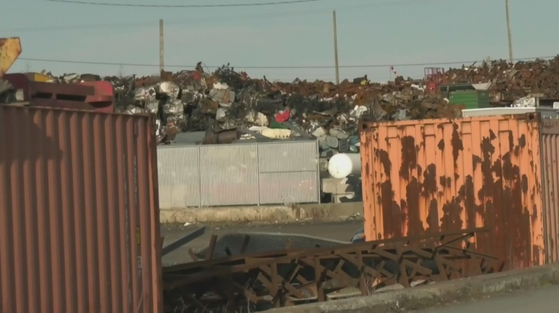 Halifax fire crews return to scrap metal yard