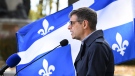 Quebec Conservative Leader Eric Duhaime speaks at a news conference, Wednesday, October 19, 2022 in front of the legislature in Quebec City. THE CANADIAN PRESS / Jacques Boissinot