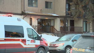 Calgary Fire Department and Calgary Police Service units outside of an apartment building in the 2600 block 16th Avenue S.E. following a fire and the discovery of a body.