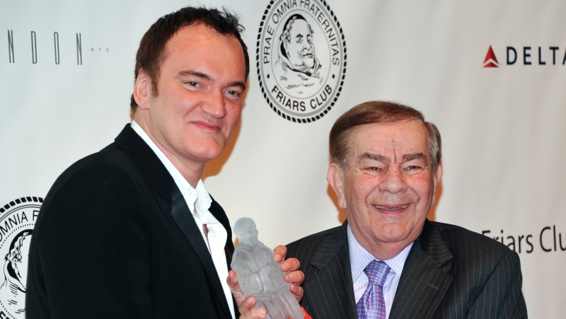 \Director Quentin Tarantino, left, poses with Friars Club Dean Freddie Roman at the Quentin Tarantino Friars Club Roast at the New York Hilton Hotel on Dec. 1, 2010, in New York. Roman, the former dean of The Friars Club and a staple of the Catskills comedy scene, has died at age 85. Roman passed away Saturday afternoon, Nov. 26, 2022, at Bethesda Hospital in Boynton Beach, Fla., his booking agent and friend Alison Chaplin said Sunday. (AP Photo/Evan Agostini, File)