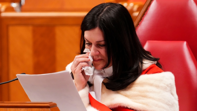 Justice Michelle O'Bonsawin wipes away a tear as she delivers a speech during her welcoming ceremony at the Supreme Court of Canada in Ottawa, on Monday, Nov. 28, 2022. THE CANADIAN PRESS/Sean Kilpatrick