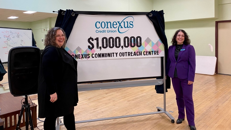 YWCA CEO Melissa Coomber-Bendtsen and Conexus Credit Union CEO Celina Philpot unveil a $1 million dollar donation. (AllisonBamford/CTVNews) 