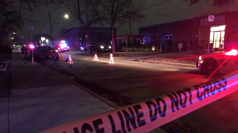 Windsor police on scene of a shooting in the 800 block of Hanna Street East in Windsor, Ont. on Monday, Nov. 28, 2022. (Michelle Maluske/CTV News Windsor)