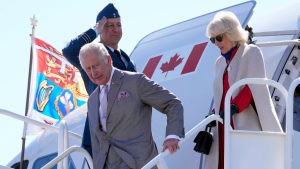 In this May 19, 2022 file photo, Prince Charles and Camilla, Duchess of Cornwall, disembark their plane in Yellowknife during part of the Royal Tour of Canada. (THE CANADIAN PRESS/Paul Chiasson)
