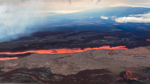 In this aerial photo released by the U.S. Geological Survey, the Mauna Loa volcano is seen erupting from vents on the Northeast Rift Zone on the Big Island of Hawaii, Monday, Nov. 28, 2022. (U.S. Geological Survey via AP)