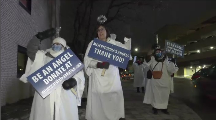 A group of people dressed as angels on Nov. 29 to support the Angel Squad fundraiser. 