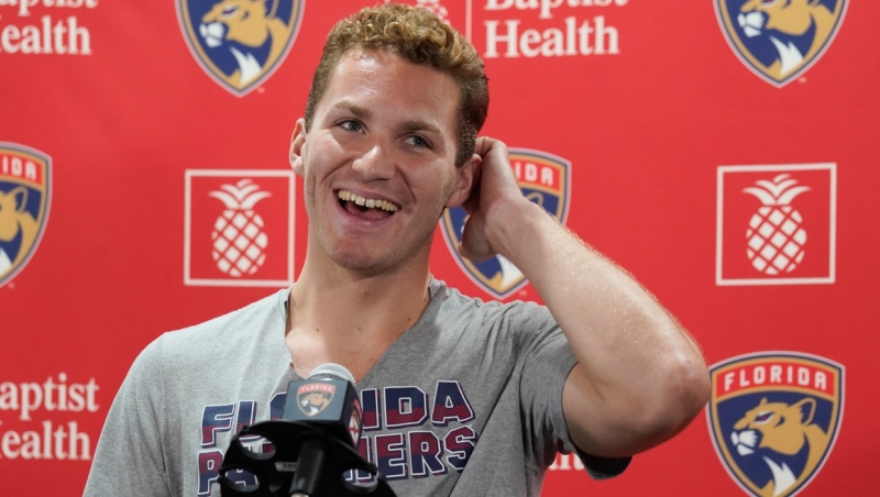 Florida Panthers' Matthew Tkachuk smiles during the NHL hockey team's media day, Wednesday, Sept. 21, 2022, in Coral Springs, Fla. (AP Photo/Marta Lavandier