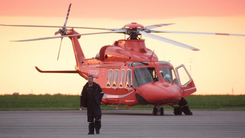 An Ornge air ambulance helicopter is secured on the tarmac in Kingston, Ont. on Monday June 9, 2014. THE CANADIAN PRESS/Colin Perkel