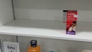 A bottle of Children's medicine sits on a self at a Waterloo region pharmacy. (Krista Sharpe/CTV News)