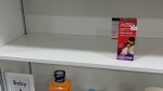 A bottle of Children's medicine sits on a self at a Waterloo region pharmacy. (Krista Sharpe/CTV News)