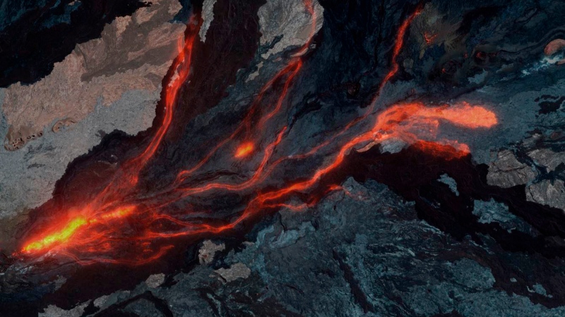 In this satellite image provided by Maxar Technologies, lava flows from the Mauna Loa volcano on the Big Island of Hawaii, Monday, Nov. 28, 2022. Waves of orange, glowing lava and ash blasted and billowed from the world's largest active volcano in its first eruption in 38 years, and officials told people living on Hawaii's Big Island to be ready in the event of a worst-case scenario. (Satellite image Â©2022 Maxar Technologies via AP)