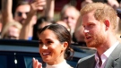 Prince Harry and Meghan, Duchess of Sussex, arrive for a visit at the town hall in Duesseldorf, Germany, Tuesday, Sept. 6, 2022. (AP Photo/Martin Meissner)