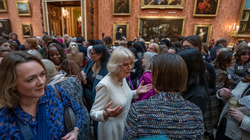 Camilla, the Queen Consort, attends a reception to raise awareness of violence against women and girls as part of the UN 16 days of Activism against Gender-Based Violence, in Buckingham Palace,  Nov. 29, 2022. (AP Photo/Kin Cheung, Pool)