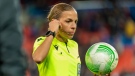 French referee Stephanie Frappart during the Europa Conference League group H soccer match between Switzerland's FC Basel 1893 and Cyprus' Omonoia Nicosia at the St. Jakob-Park stadium in Basel, Switzerland, Thursday, Oct. 21, 2021. (Georgios Kefalas/Keystone via AP)