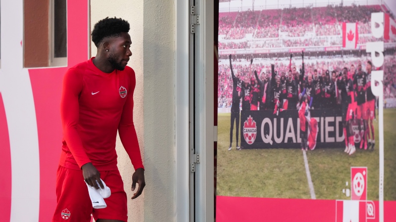 Canada forward Alphonso Davies arrives during practice at the World Cup in Doha, Qatar on Tuesday, November 29, 2022. THE CANADIAN PRESS/Nathan Denette