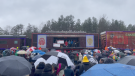Hundreds of people turned up despite the weather to watch performers on the CP Holiday Train in Springwater Township on Wed., Nov. 30, 2022 (CTV News/Catalina Gillies)