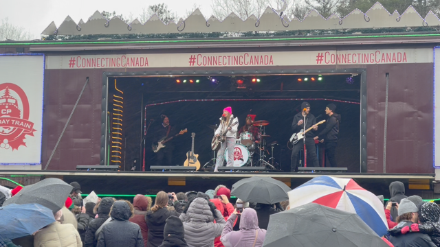 Hundreds of people turned up despite the weather to watch performers on the CP Holiday Train in Springwater Township on Wed., Nov. 30, 2022 (CTV News/Catalina Gillies)