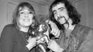 Bass guitarist John McVie, of the Fleetwood Mac pop group, right, and Christine Perfect of the Chicken Shack Group appear at a party for Fleetwood Mac, in London, on Feb. 20, 1969. Christine McVie, the soulful British musician who sang lead on many of Fleetwood Macâ€™s biggest hits, has died at 79. The band announced her death on social media Wednesday, (AP Photo/Bob Dear, File) 