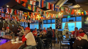 Regina soccer fans watch a Canada FIFA World Cup Match at The Lobby Kitchen and Bar on Dec. 1, 2022. (Allison Bamford/CTV News) 