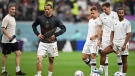Leroy Sane, middle left, of Germany warms up with teammates prior to the FIFA World Cup Qatar 2022 Group E match between Costa Rica and Germany at Al Bayt Stadium on Dec. 01, 2022 in Al Khor, Qatar. (Photo by Stuart Franklin/Getty Images)