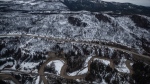 A mountainside is covered with snow as the Coldwater River snakes along side the Coquihalla Highway south of Merritt, B.C. The Fraser Valley is under an Environment Canada arctic outflow warning as of Dec.1. (THE CANADIAN PRESS/Darryl Dyck)