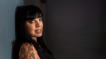Bif Naked poses for a portrait in Toronto on Wednesday, April 20, 2016. After battling misogyny and drugs on the music scene, facing sexual assault and a divorce -- not to mention surviving breast cancer, kidney failure and heart surgery -- the Vancouver singer-songerwriter is newly engaged, feeling healthy and plans to record a new "very loud" record. THE CANADIAN PRESS/Christopher Katsarov