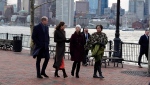 Prince William and Kate, Princess of Wales, walk with Boston Mayor Michelle Wu and Reverend Mariama White-Hammond, right, during a visit to Piers Park, Thursday, Dec. 1, 2022, in Boston. (AP Photo/Mary Schwalm)