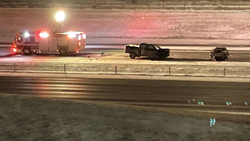 A damaged truck and car on Deerfoot Trail following a fatal early morning head-on crash between the 16th Avenue and 32nd Avenue N.E. overpasses.