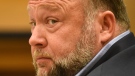 Infowars founder Alex Jones appears in court to testify during the Sandy Hook defamation damages trial at Connecticut Superior Court in Waterbury, Conn., Sept. 22, 2022. (Tyler Sizemore/Hearst Connecticut Media via AP, Pool, File)