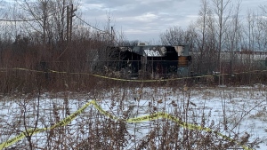 A trailer seen roped off with police tape on Friday Dec. 2, 2022 in Kitchener. (CTV News/Krista Simpson)