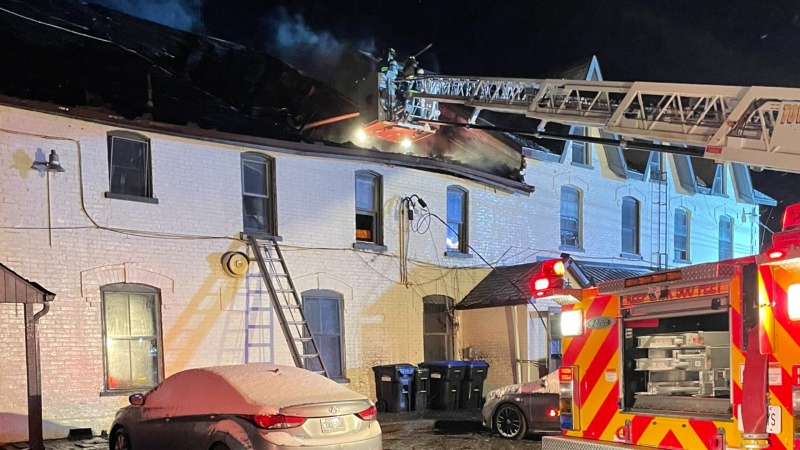 Firefighters attend the scene of a fire at a building in Creemore, Ont., on Thurs., Dec. 1, 2022. (Twitter/Creemore Acting Fire Chief Scott Davison)