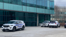 Police cruisers outside La Cite on Aviation Parkway on Friday. The school said the campus was placed in a secure mode, "following a threat." (Chris Black/CTV News Ottawa)