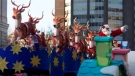 Santa Claus waves to the crowd from his float during the Santa Claus parade in Toronto on Sunday, Nov. 15, 2015. THE CANADIAN PRESS/Marta Iwanek