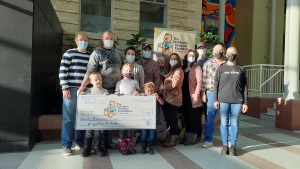 Kaylene and her husband Justin Pryor made a donation of $20,084.58 to the Children's Hospital on Saturday, money raised at a social held by the Pryors in Crystal City, Man. to give back to the foundation. (Source: Dan Timmerman, CTV News)