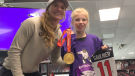 Canadian forward Jill Saulnier stands with Leah Blaise at the EmpowHER Hockey Fest at the Arena at TD Place. (Jackie Perez/CTV News Ottawa)
