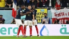 France's forward Kylian Mbappe, middle, celebrates scoring his team's second goal with France's forward Marcus Thuram, left, and France's forward Ousmane Dembele during the Qatar 2022 World Cup round of 16 football match between France and Poland at the Al-Thumama Stadium in Doha on Dec. 4, 2022. (Photo by Andrej Isakovic/AFP via Getty Images)