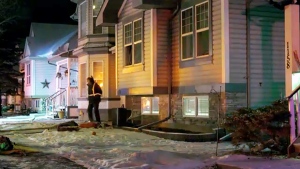 Firefighters work to contain a couch fire in southeast Calgary Saturday night