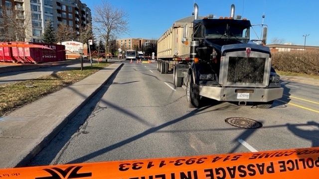 A woman was killed after being struck by a 53-foot truck on Montreal's Nuns' Island. (Pedro Querido/CTV News)