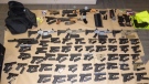 A number of guns allegedly seized by Toronto police are seen in this image. (Toronto Police Service)