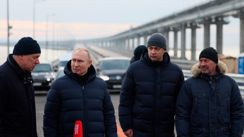 Russian President Vladimir Putin, second left, visits the Crimean Bridge connecting Russian mainland and Crimean peninsula over the Kerch Strait, on Dec. 5, 2022. (Mikhail Metzel, Sputnik, Kremlin Pool Photo via AP) 