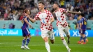 Croatia's Ivan Perisic, centre, celebrates after scoring his side's opening goal during the World Cup round of 16 soccer match between Japan and Croatia at the Al Janoub Stadium in Al Wakrah, Qatar, Monday, Dec. 5, 2022. (AP Photo/Thanassis Stavrakis)