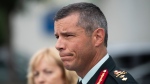 Maj.-Gen. Dany Fortin speaks to reporters outside the Gatineau Police Station after being processed, in Gatineau, Que., on Wednesday, Aug. 18, 2021. THE CANADIAN PRESS/Justin Tang