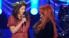 Ashley Judd, left, and Wynonna Judd speak during a tribute to their mother, country music star Naomi Judd, Sunday, May 15, 2022, in Nashville, Tenn. Naomi Judd died April 30. She was 76. (AP Photo/Mark Humphrey) 