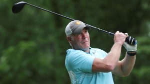 Brett Favre watches a tee shot on the 10th hole during the celebrity foursome at the American Family Insurance Championship golf tournament at University Ridge in Madison, Wis., Saturday, June 11, 2022. (Kayla Wolf/Wisconsin State Journal via AP)