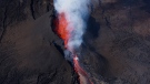 In an aerial view, lava shoots up from a fissure of the Mauna Loa Volcano as it erupts in Hilo, Hawaii. (Justin Sullivan/Getty Images)