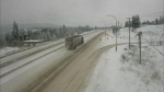 Snow and slush are seen on the Trans-Canada Highway west of Salmon Arm, B.C., in a highway camera image captured on Dec. 6, 2022. 